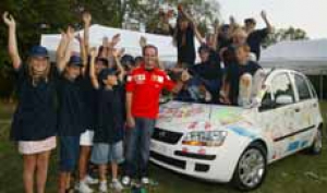 Schumacher, Barrichello y Fiat colaboran con Unicef